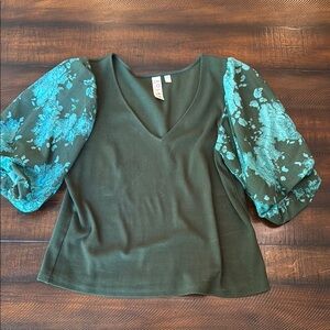Green Top with Blue Floral Sleeves